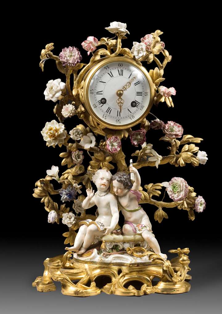 A LOUIS XV ORMOLU-MOUNTED PORCELAIN Mantel-Clock